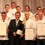 Champagne Laurent-Perrier -- Thomas Schreiner (Mi. mit Champagnerflasche) und die ausgezeichneten Spitzenköche